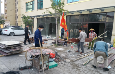 物業(yè)公司開展“學習雷鋒精神 踐行志愿服務”主題黨日活動